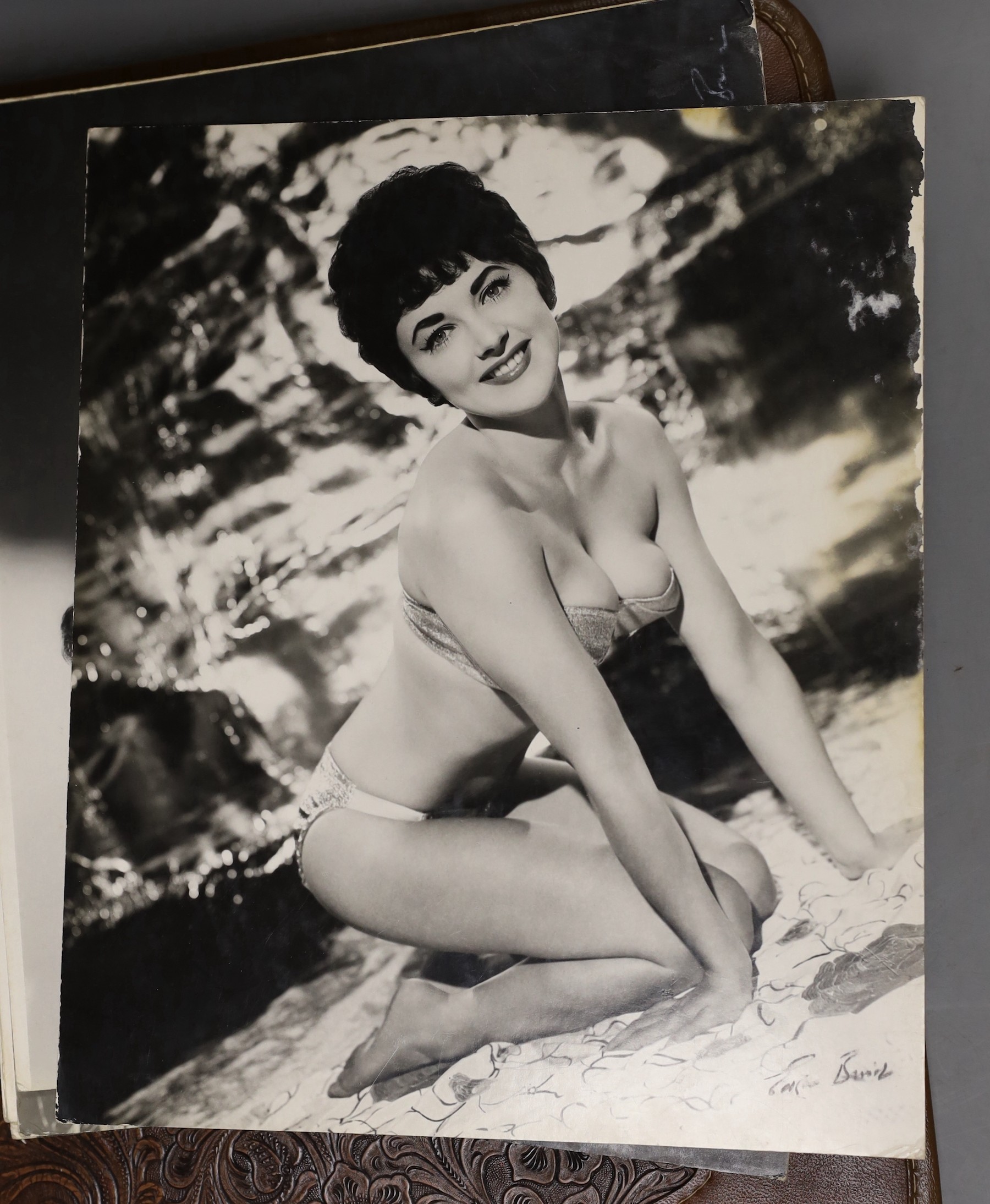 A collection of black and white 1960’s photos from the Windmill Theatre, London, some signed by the photographer together with a Mauchline ware album containing photos of Sussex